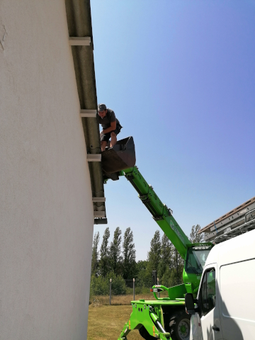 Roofers in action
